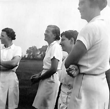Myrtle Maclagan with unidentified player(s)