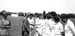 Myrtle Maclagan with unidentified players and guest at Cricket Week 1949 from her photo album